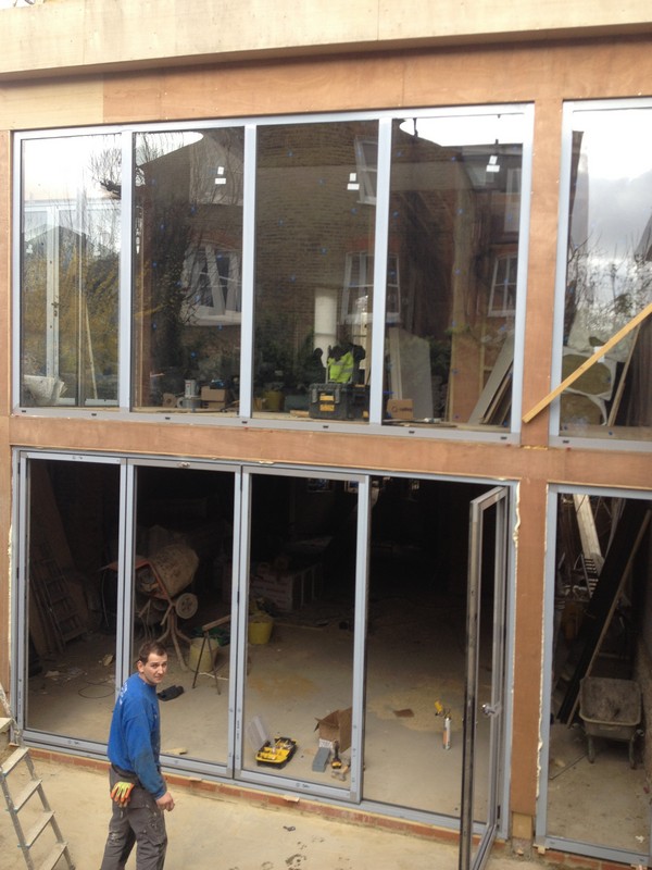 Aluminium bi-fold doors with two-storey glazing in Penge